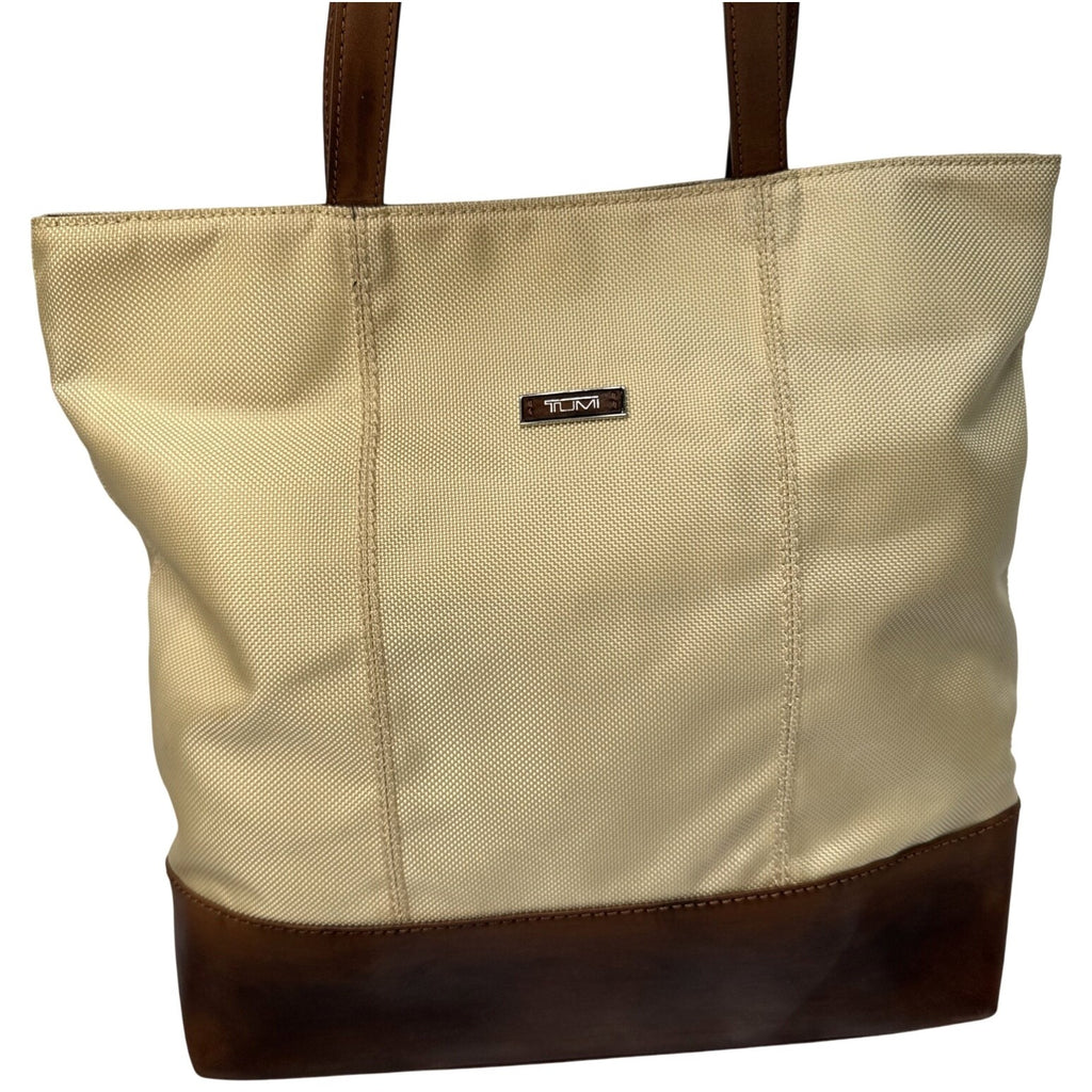 Tumi Beige Canvas & Brown Leather Tote Bag With Rear Zip Pocket And Handles