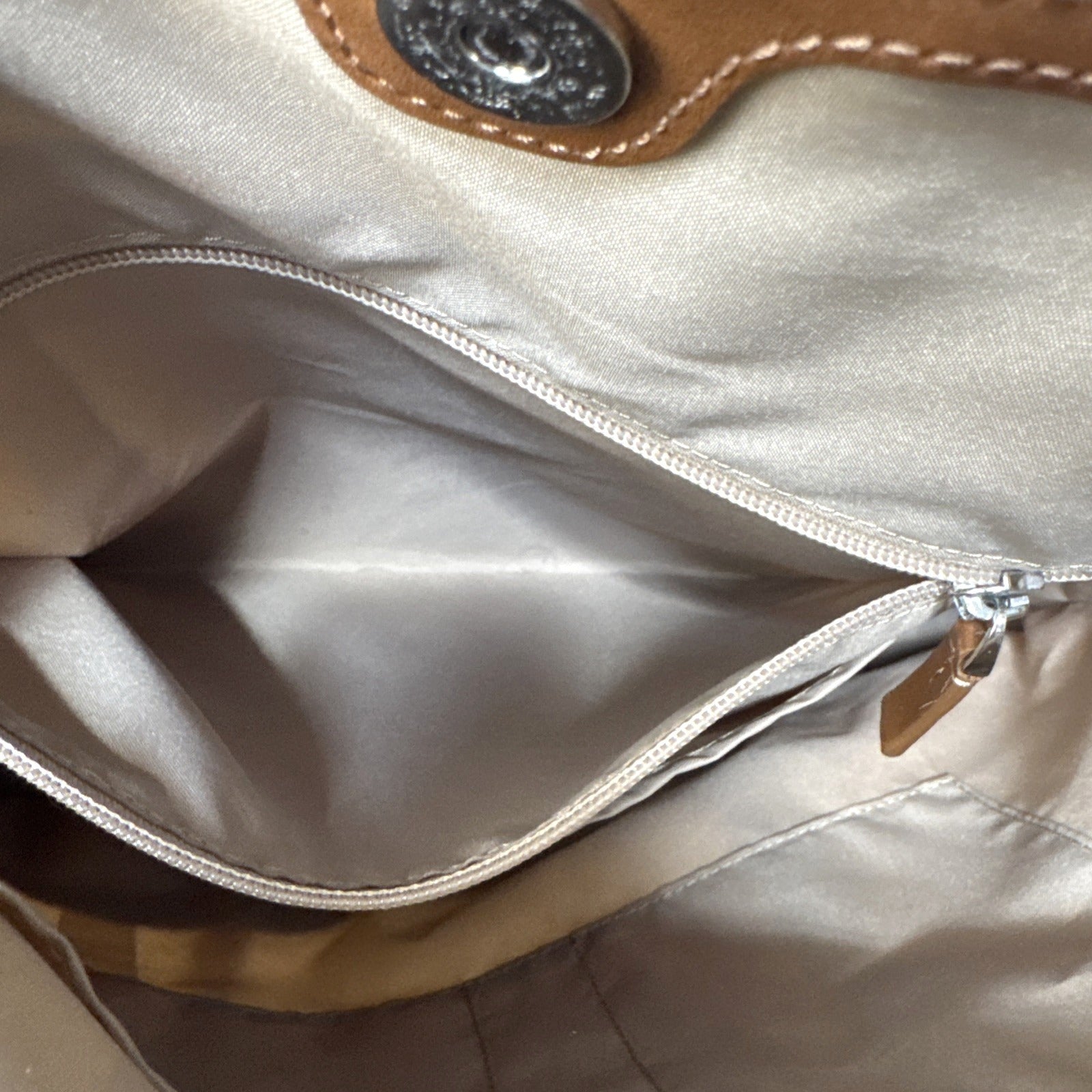 Tumi Beige Canvas & Brown Leather Tote Bag With Rear Zip Pocket And Handles