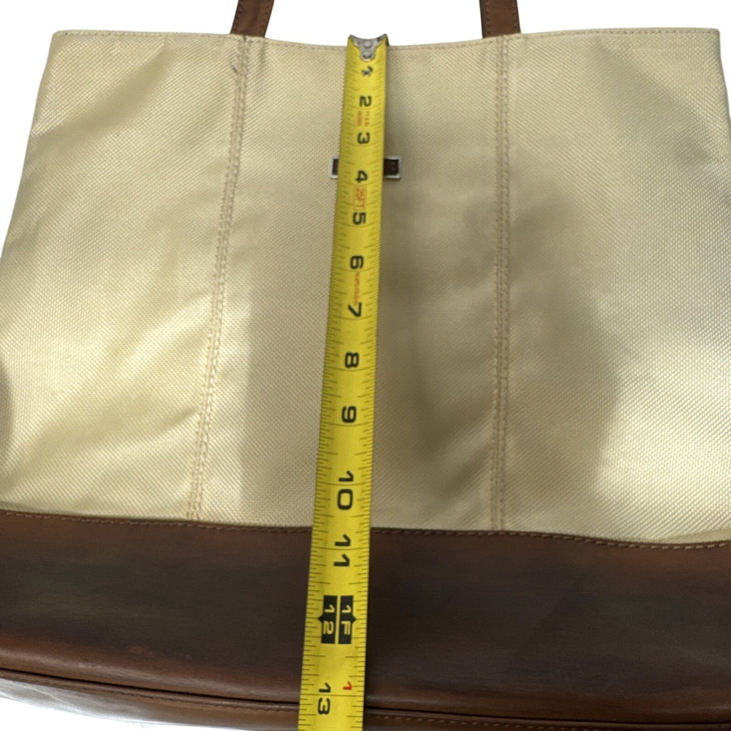 Tumi Beige Canvas & Brown Leather Tote Bag With Rear Zip Pocket And Handles