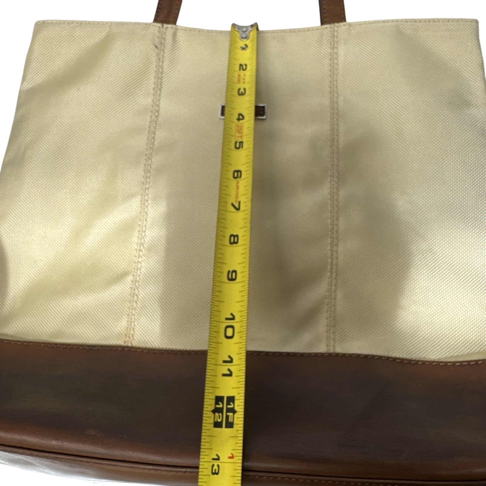 Tumi Beige Canvas & Brown Leather Tote Bag With Rear Zip Pocket And Handles