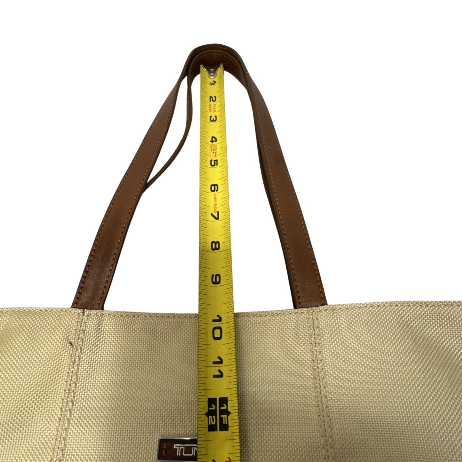 Tumi Beige Canvas & Brown Leather Tote Bag With Rear Zip Pocket And Handles