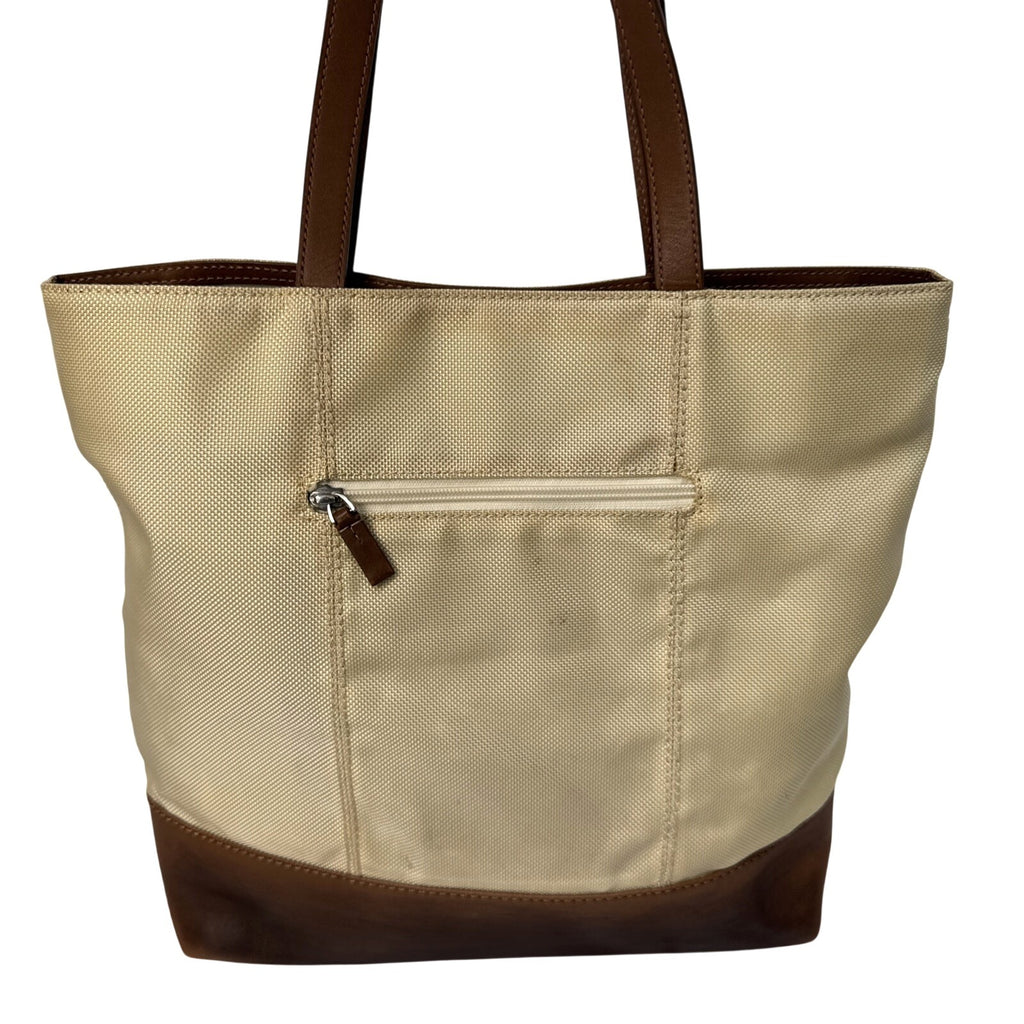Tumi Beige Canvas & Brown Leather Tote Bag With Rear Zip Pocket And Handles