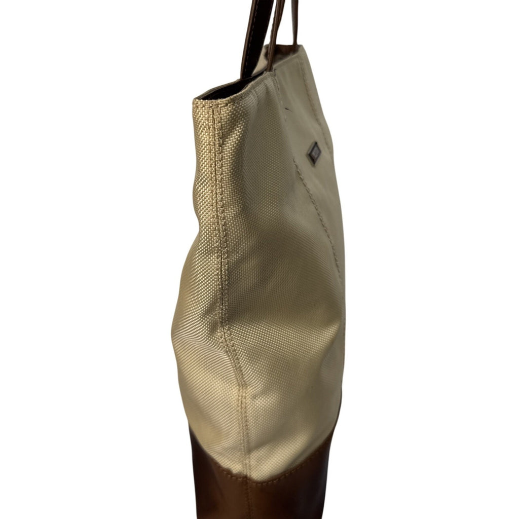 Tumi Beige Canvas & Brown Leather Tote Bag With Rear Zip Pocket And Handles