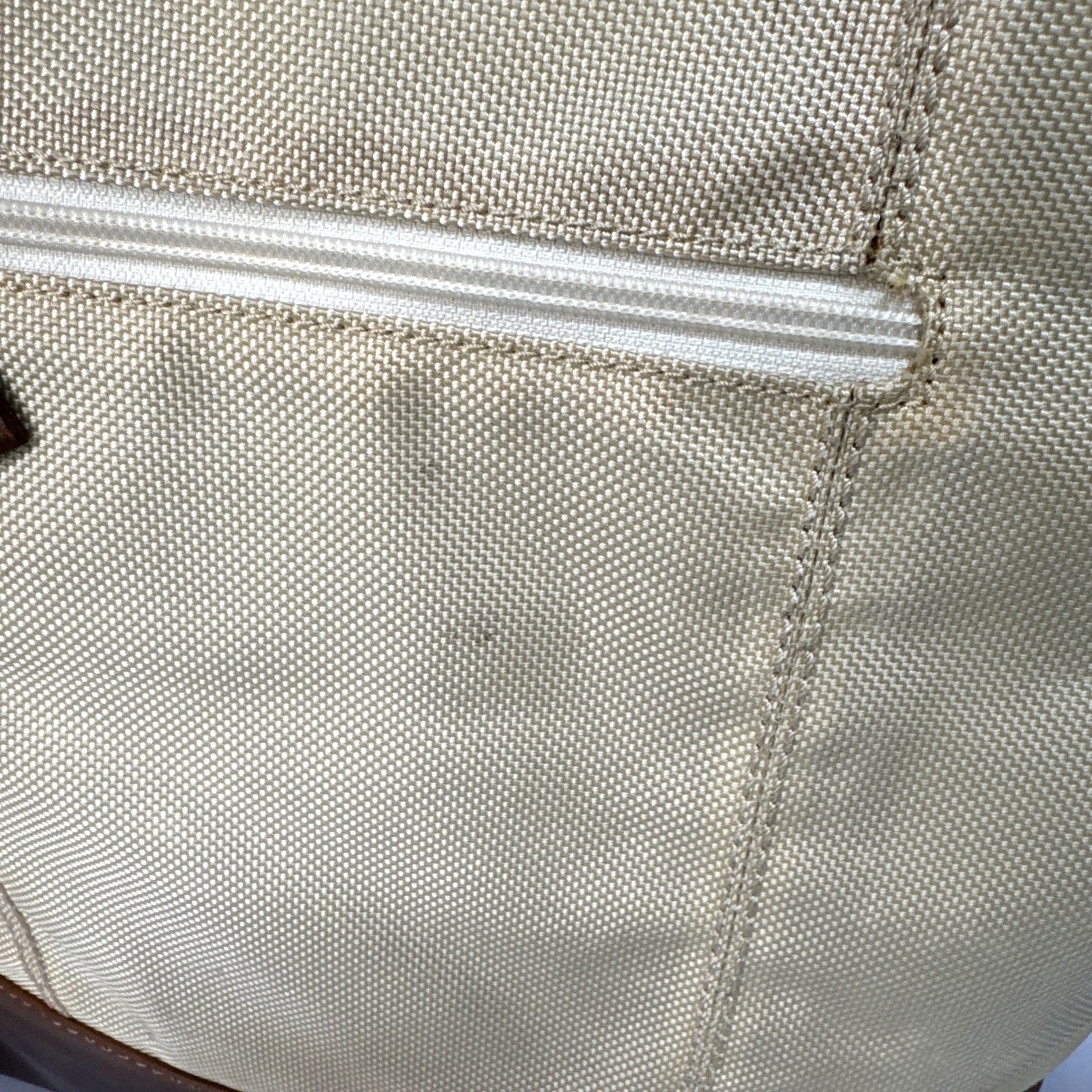 Tumi Beige Canvas & Brown Leather Tote Bag With Rear Zip Pocket And Handles