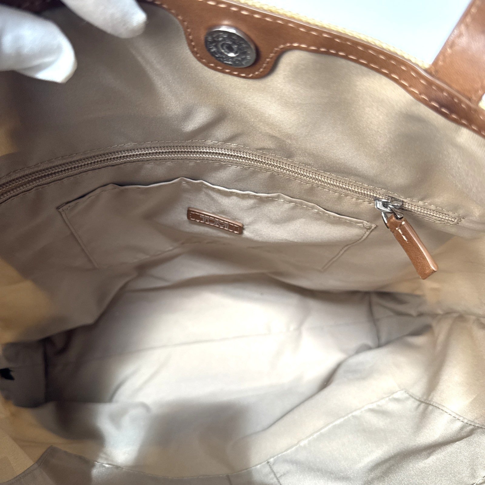 Tumi Beige Canvas & Brown Leather Tote Bag With Rear Zip Pocket And Handles