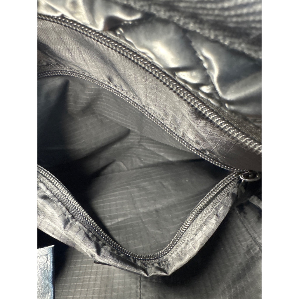 Haute Shore Quilted Black Crossbody Bag With Adjustable Strap & Interior Zipper Pocket
